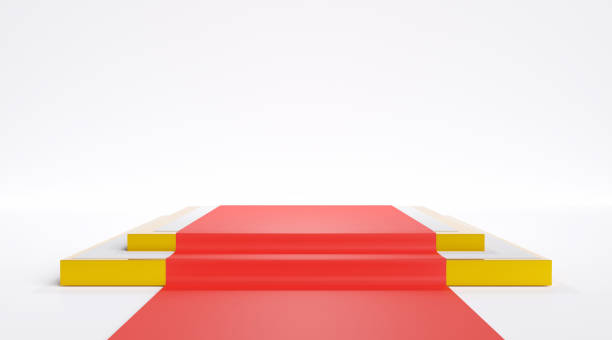 istock square podium, red carpet on white and gold golstairs. 1417992776