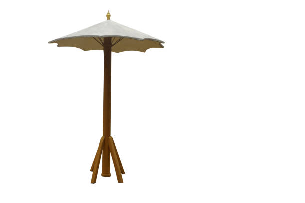 istock A large white and brown cement umbrella on white background, object, decor, vintage, copy space 1417996199