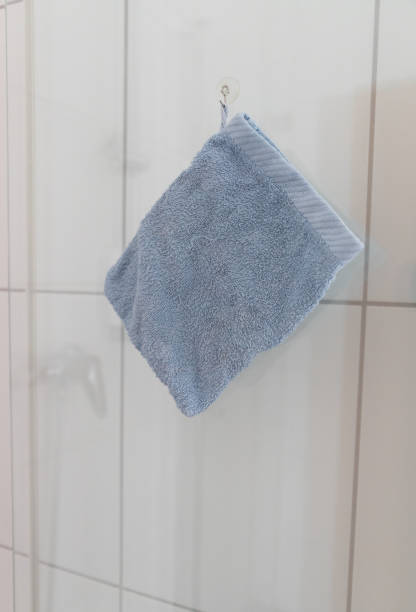 istock a washcloth on a glass door 1417998105