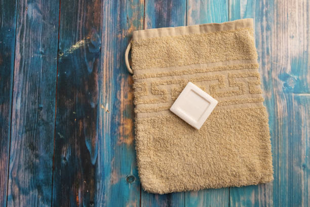 washcloth on a table with a piece of soap