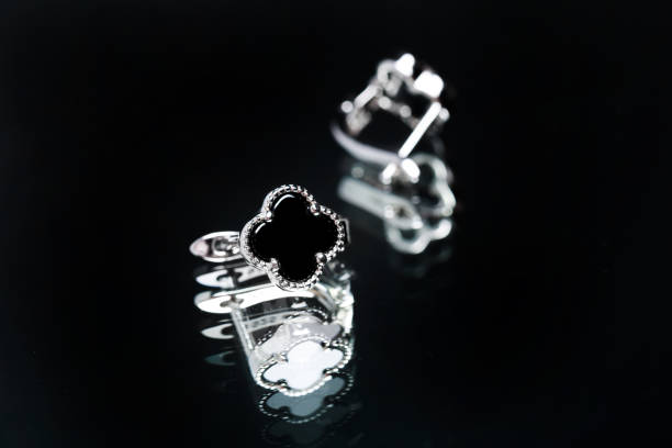 istock earrings with black enamel on black background 1418000165