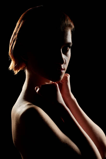 istock woman in dark 1418003680