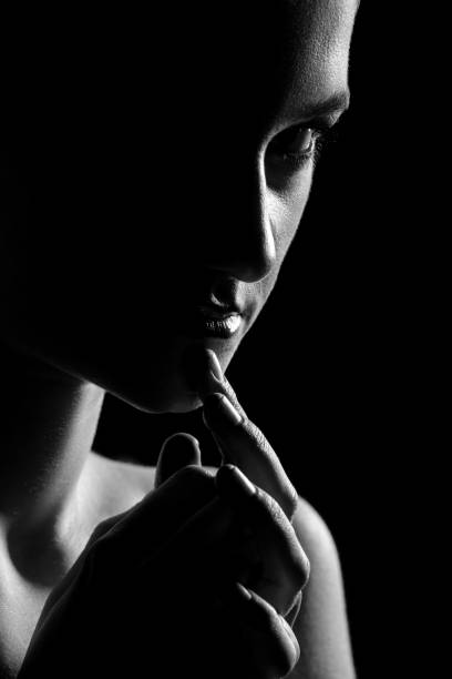 istock woman in dark 1418003728