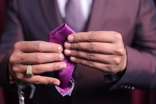 Hand man with suit wedding india with ring with tie