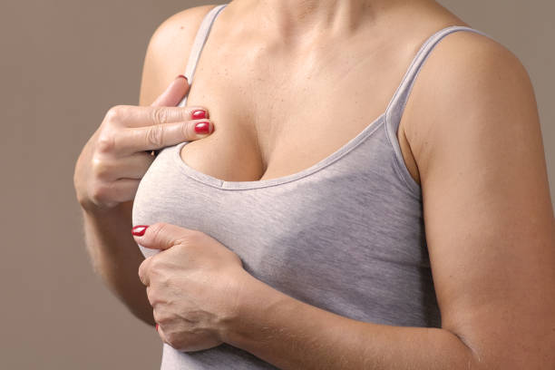 Women doing self-checks for breast cancerA warm blanket warms and saves a little from the cold. The problem of heat in the homes of Europeans due to rising gas and heating prices A warm blanket warms and saves a little from the cold. The problem of heat in the homes of Europeans due to rising gas and heating prices warms stock pictures, royalty-free photos & images