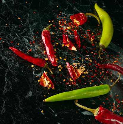 Chili pepper on black background