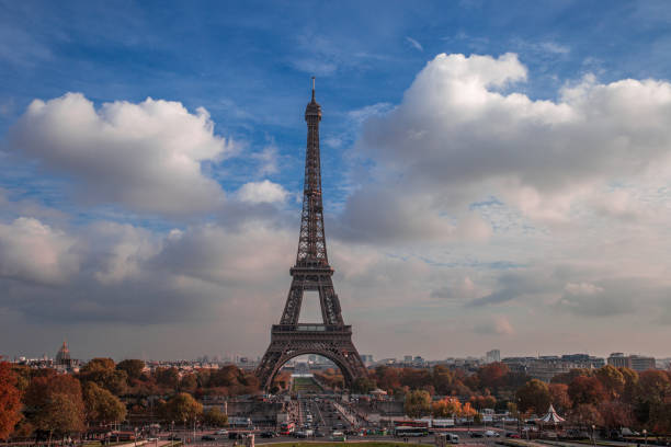 istock side view of the eiffel tower with the seine river beside it 1418010385