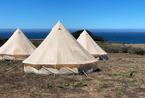 Glamping in meadow by ocean in northern California in the Sea Ranch.