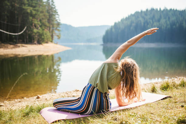 istock Doing yoga for a healthy lifestyle 1418017878