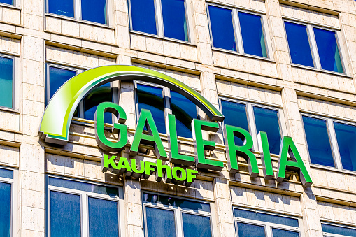 Munich, Germany - August 22: The logo of the department store chain Galeria Kaufhof, which is closing this branch, at Stachus (Karlsplatz) in Munich on August 22, 2022