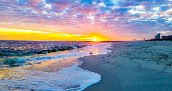 Dramatic Winter Sunset on the beach at Alabama Point, Orange Beach, Alabama, Gulf of Mexico