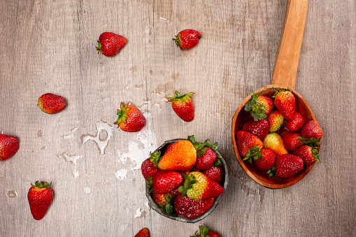 strawberries falling in water