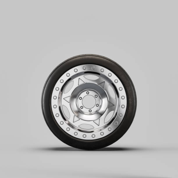 istock Car wheel on white background. Isolated car tire with shiny rim from front view. 3d rendering 1418023564