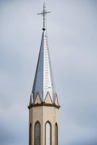 istock Tower of a Catholic church in a triangular shape 1418025447