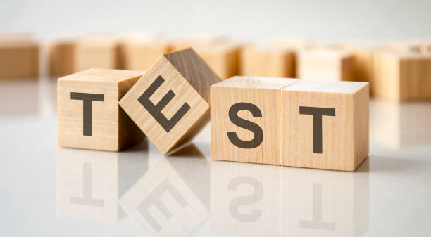 istock text TEST written on wood toy cubes. text for your desing 1418030432