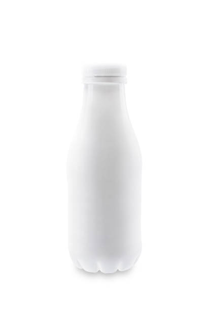 White plastic bottle with milk on a white isolated background. toning. selective focus
