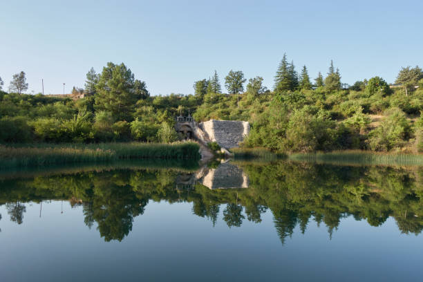 istock reflection of an old dam in the lagoon 1418038230