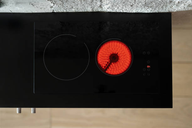 istock electrical induction stove on black countertop at kitchen 1418039036