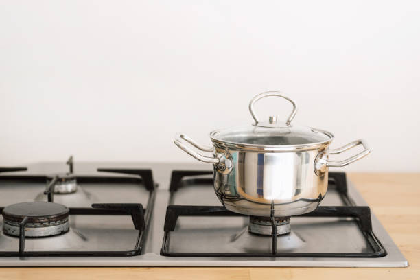 istock steel saucepan on gas stove in kitchen 1418040418