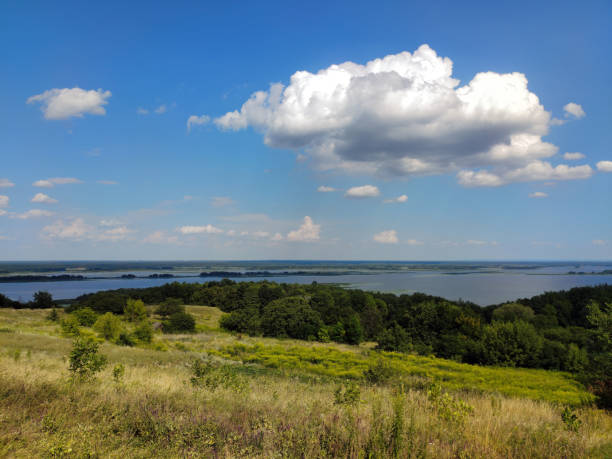 istock View from the hill on a big scenic river and blue sky with clouds 1418040554