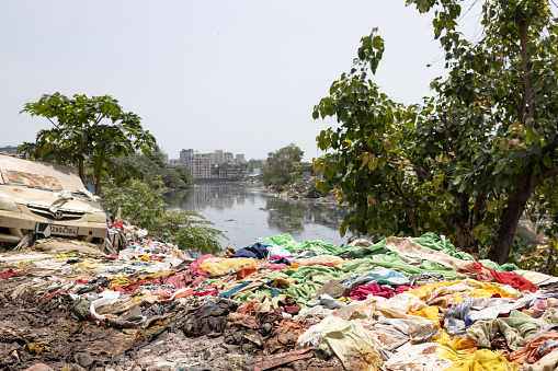 Mumbai,India-7-28-2022: Garbage dumped on the banks on Meeti river sweet river near Kalina area.