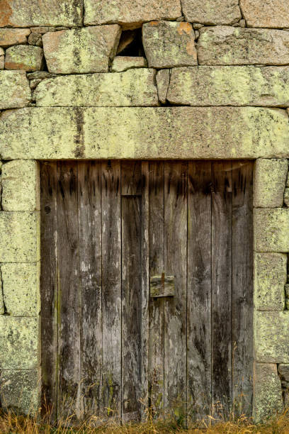 istock worn wooden door 1418044043