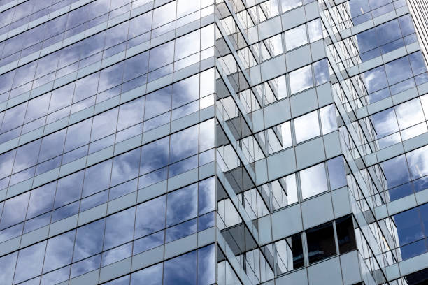 istock Closeup modern corporate glass building, background with copy space 1418047574