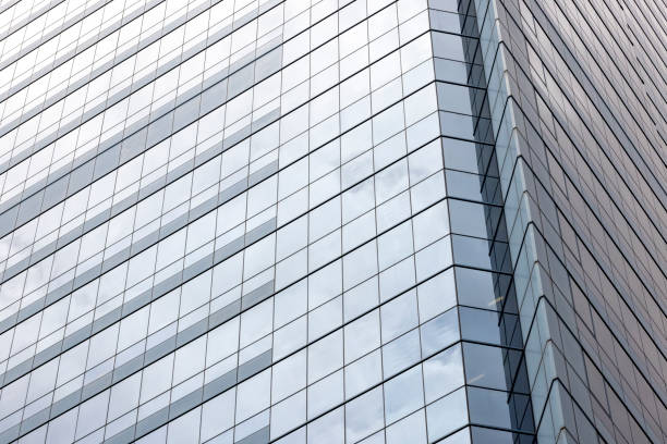 istock Closeup modern corporate glass building, background with copy space 1418049504