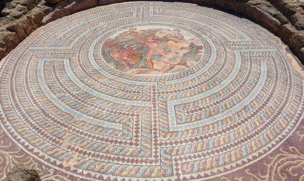 Ancient Roman empirical mosaic art floor in Cyprus stock photo