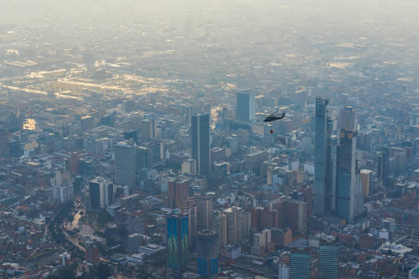 istock Firefighting helicopter flying over Bogota, Colombia 1418055789