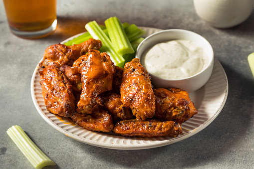Homemade Spicy Buffalo Chicken Wings with Celery and Blue Cheese