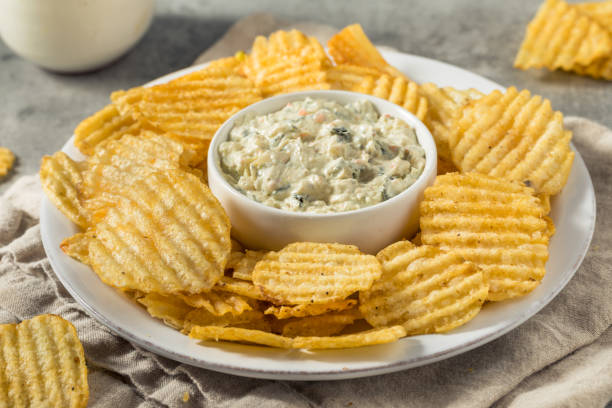 istock Unhealthy Potato Chips and Dip Appetizer 1418056456