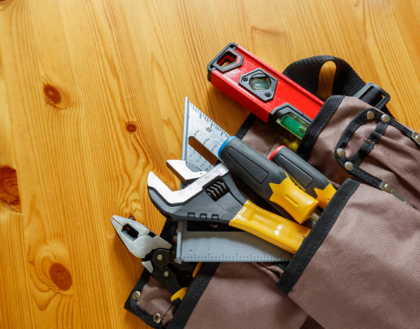 istock Carpenter tools on wood background. Wide. Top view. 1418057063