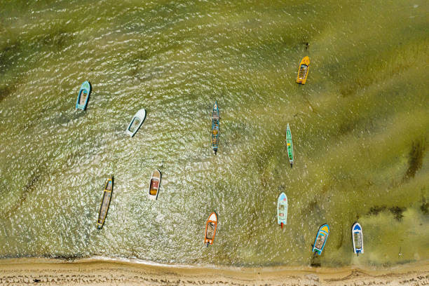 Aerial drone of Beach with fishing boats. stock photo