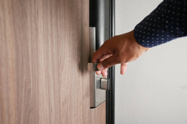 istock Man's Hand Opening door close up 1418063470