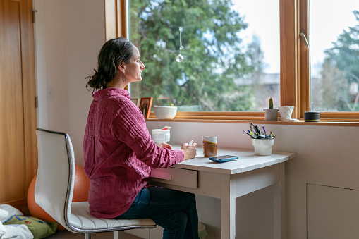 Woman working in her home office