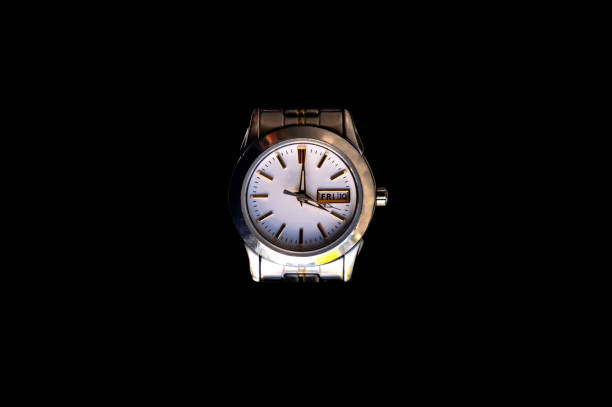 istock watch  isolated on black background 1418073773