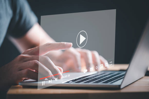 istock Businessman use laptop computer to watching and live streaming window. Online live stream window. Video streaming on internet concept. 1418073849