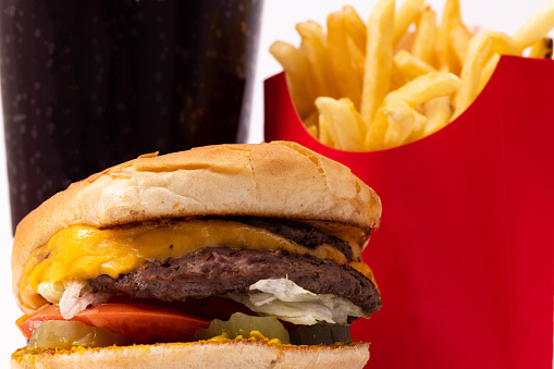 Fast food meal with a burger, drink, and french fries