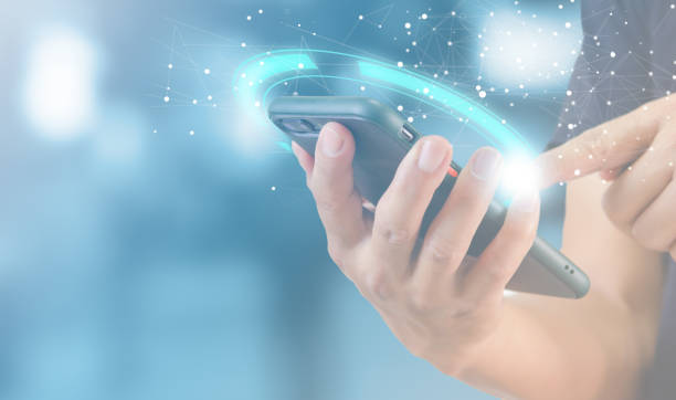 istock Technology innovation and communication concept of a man using a mobile smart phone digital internet social online with a global network connection. 1418075726