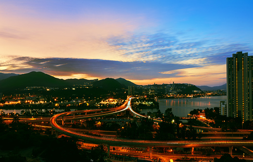 Car Light Trails of Sewage treatment plant, Shing Mun River and Sha Tin Sea after sunset
