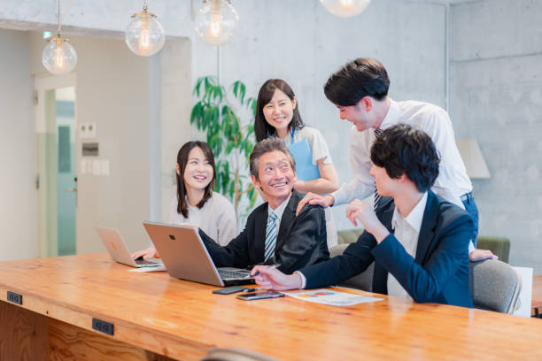 istock Businessperson happily working in an office 1418076052