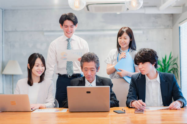 istock Businessperson happily working in an office 1418076079
