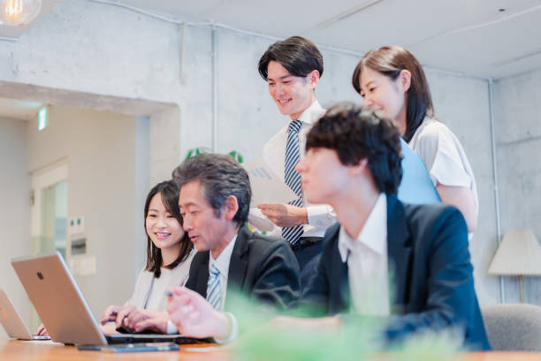 istock Businessperson happily working in an office 1418076080