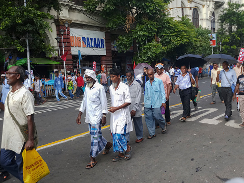 Kolkata, West Bengal, India - 5th August 2019 : Political rally by Socialist Unity Centre of India, Communist on the street of Kolkata. Against the ruling party, All India Trinamool Congress.