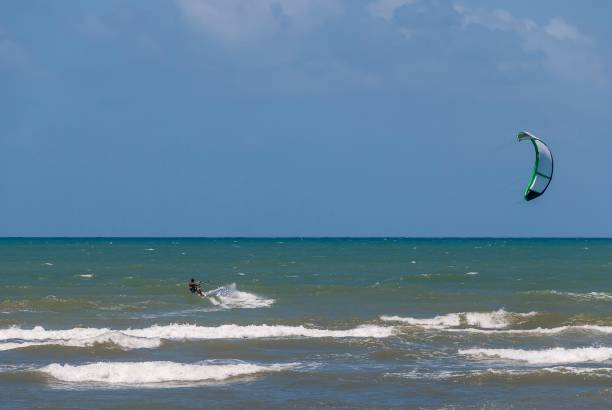 istock Forte Beach, Bahia - Brazil. Man practicing kite surfing . 1418085730