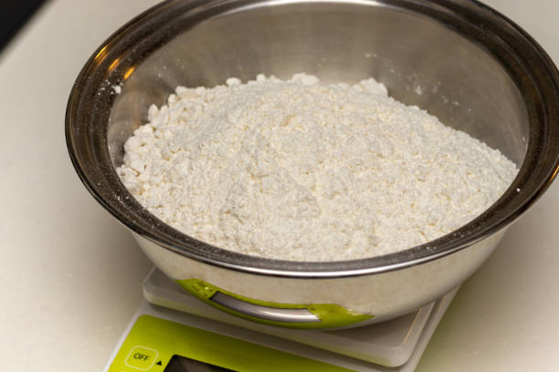 istock Weigh the flour on the scale 1418085818