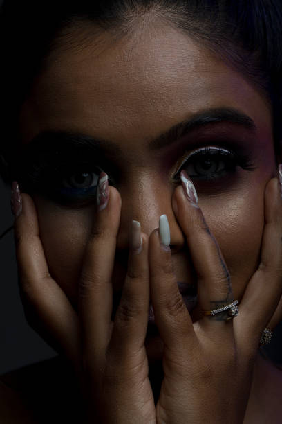 istock Beautiful woman with perfect make-up looking at camera 1418101037
