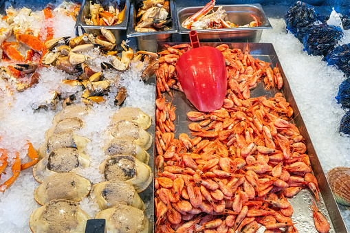 Clams and prawns for sale at a market in Bergen, Norway