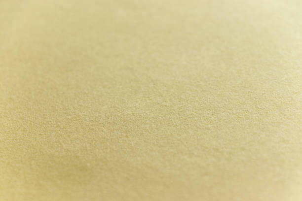 istock Surface texture of cream color wallpaper 1418107451